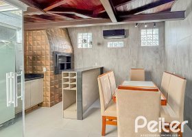 Casa em Condomínio à venda com 117m², 3 dormitórios, 1 suíte, 2 vagas, no bairro Vila Nova em PORTO ALEGRE
