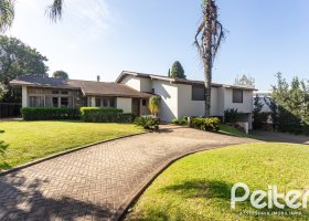 Casa em Condomínio à venda com 328m², 3 dormitórios, 2 suítes, 4 vagas, no bairro Cavalhada em PORTO ALEGRE