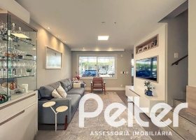 Casa em Condomínio à venda com 120m², 3 dormitórios, 1 suíte, 2 vagas, no bairro Vila Nova em PORTO ALEGRE
