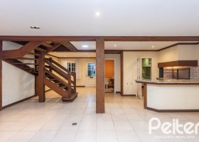 Casa em Condomínio à venda com 216m², 2 dormitórios, 2 suítes, 2 vagas, no bairro Terra Ville em PORTO ALEGRE
