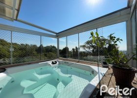 Casa em Condomínio à venda com 105m², 3 dormitórios, 1 suíte, 2 vagas, no bairro Tristeza em Porto Alegre