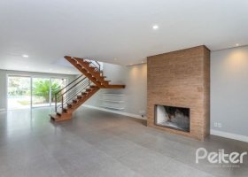 Casa em Condomínio à venda com 243m², 3 dormitórios, 3 suítes, 4 vagas, no bairro Terra Ville em PORTO ALEGRE