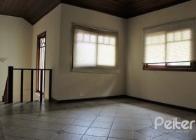 Casa em Condomínio à venda com 225m², 3 dormitórios, 1 suíte, 2 vagas, no bairro Jardim Isabel em Porto Alegre