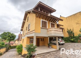 Casa em Condomínio à venda com 186m², 3 dormitórios, 1 suíte, 2 vagas, no bairro Jardim Isabel em Porto Alegre