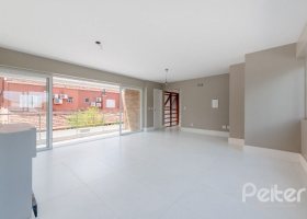 Casa em Condomínio à venda com 233m², 3 dormitórios, 1 suíte, 3 vagas, no bairro Vila Assunção em Porto Alegre