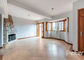 Casa à venda com 217m², 3 dormitórios, 1 suíte, 2 vagas, no bairro Ipanema / Imperial Parque em Porto Alegre