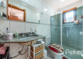 Casa em Condomínio à venda com 204m², 3 dormitórios, 1 suíte, 2 vagas, no bairro Cristal em Porto Alegre