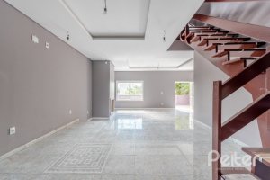 Casa à venda com 300m², 4 dormitórios, 4 suítes, 4 vagas, no bairro Vila Assunção em Porto Alegre