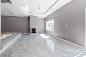 Casa à venda com 300m², 4 dormitórios, 4 suítes, 4 vagas, no bairro Vila Assunção em Porto Alegre