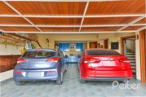 Casa em Condomínio à venda com 389m², 4 dormitórios, 3 suítes, 4 vagas, no bairro Vila Nova em Porto Alegre