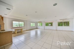 Casa em Condomínio à venda com 389m², 4 dormitórios, 3 suítes, 4 vagas, no bairro Vila Nova em Porto Alegre