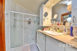 Casa em Condomínio à venda com 389m², 4 dormitórios, 3 suítes, 4 vagas, no bairro Vila Nova em Porto Alegre