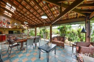 Casa em Condomínio à venda com 389m², 4 dormitórios, 3 suítes, 4 vagas, no bairro Vila Nova em Porto Alegre