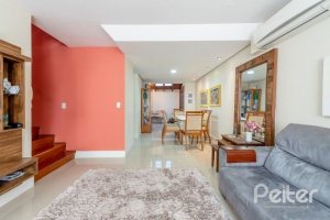 Casa em Condomínio à venda com 162m², 3 dormitórios, 1 suíte, 2 vagas, no bairro Vila Assunção em PORTO ALEGRE