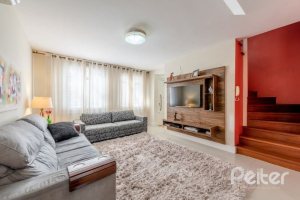 Casa em Condomínio à venda com 162m², 3 dormitórios, 1 suíte, 2 vagas, no bairro Vila Assunção em PORTO ALEGRE