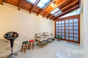 Casa em Condomínio à venda com 162m², 3 dormitórios, 1 suíte, 2 vagas, no bairro Vila Assunção em PORTO ALEGRE