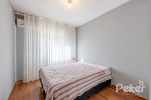 Casa em Condomínio à venda com 162m², 3 dormitórios, 1 suíte, 2 vagas, no bairro Vila Assunção em PORTO ALEGRE