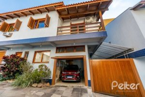 Casa em Condomínio à venda com 145m², 3 dormitórios, 1 suíte, 2 vagas, no bairro Tristeza em Porto Alegre