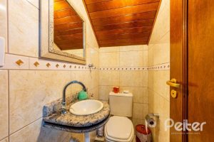 Casa em Condomínio à venda com 145m², 3 dormitórios, 1 suíte, 2 vagas, no bairro Tristeza em Porto Alegre