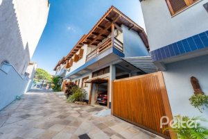 Casa em Condomínio à venda com 145m², 3 dormitórios, 1 suíte, 2 vagas, no bairro Tristeza em Porto Alegre