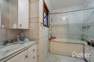 Casa em Condomínio à venda com 145m², 3 dormitórios, 1 suíte, 2 vagas, no bairro Tristeza em Porto Alegre