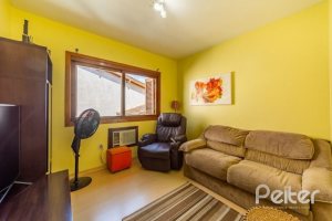 Casa em Condomínio à venda com 145m², 3 dormitórios, 1 suíte, 2 vagas, no bairro Tristeza em Porto Alegre