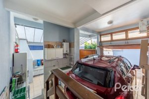 Casa em Condomínio à venda com 145m², 3 dormitórios, 1 suíte, 2 vagas, no bairro Tristeza em Porto Alegre