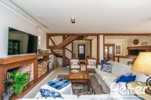 Casa em Condomínio à venda com 321m², 4 dormitórios, 2 suítes, 4 vagas, no bairro Terra Ville em PORTO ALEGRE