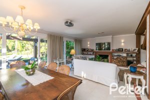 Casa em Condomínio à venda com 321m², 4 dormitórios, 2 suítes, 4 vagas, no bairro Terra Ville em PORTO ALEGRE