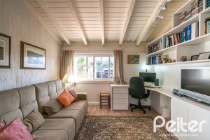 Casa em Condomínio à venda com 321m², 4 dormitórios, 2 suítes, 4 vagas, no bairro Terra Ville em PORTO ALEGRE