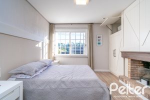 Casa em Condomínio à venda com 321m², 4 dormitórios, 2 suítes, 4 vagas, no bairro Terra Ville em PORTO ALEGRE