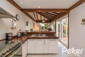 Casa em Condomínio à venda com 321m², 4 dormitórios, 2 suítes, 4 vagas, no bairro Terra Ville em PORTO ALEGRE