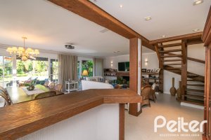 Casa em Condomínio à venda com 321m², 4 dormitórios, 2 suítes, 4 vagas, no bairro Terra Ville em PORTO ALEGRE