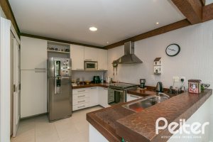 Casa em Condomínio à venda com 321m², 4 dormitórios, 2 suítes, 4 vagas, no bairro Terra Ville em PORTO ALEGRE