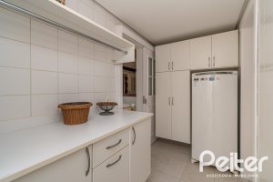 Casa em Condomínio à venda com 321m², 4 dormitórios, 2 suítes, 4 vagas, no bairro Terra Ville em PORTO ALEGRE