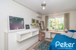 Casa em Condomínio à venda com 321m², 4 dormitórios, 2 suítes, 4 vagas, no bairro Terra Ville em PORTO ALEGRE