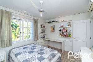 Casa em Condomínio à venda com 321m², 4 dormitórios, 2 suítes, 4 vagas, no bairro Terra Ville em PORTO ALEGRE