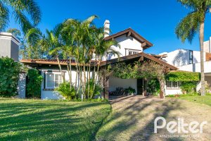 Casa em Condomínio à venda com 321m², 4 dormitórios, 2 suítes, 4 vagas, no bairro Terra Ville em PORTO ALEGRE