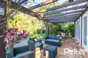 Casa em Condomínio à venda com 321m², 4 dormitórios, 2 suítes, 4 vagas, no bairro Terra Ville em PORTO ALEGRE