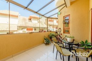 Casa em Condomínio à venda com 240m², 3 dormitórios, 1 suíte, 3 vagas, no bairro Jardim Isabel em Porto Alegre