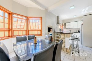 Casa em Condomínio à venda com 240m², 3 dormitórios, 1 suíte, 3 vagas, no bairro Jardim Isabel em Porto Alegre