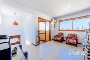 Casa em Condomínio à venda com 240m², 3 dormitórios, 1 suíte, 3 vagas, no bairro Jardim Isabel em Porto Alegre