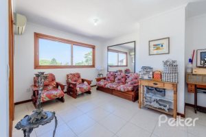 Casa em Condomínio à venda com 240m², 3 dormitórios, 1 suíte, 3 vagas, no bairro Jardim Isabel em Porto Alegre