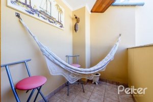 Casa em Condomínio à venda com 240m², 3 dormitórios, 1 suíte, 3 vagas, no bairro Jardim Isabel em Porto Alegre