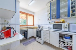 Casa em Condomínio à venda com 252m², 3 dormitórios, 1 suíte, 3 vagas, no bairro Tristeza em Porto Alegre