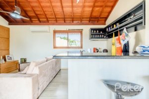 Casa em Condomínio à venda com 252m², 3 dormitórios, 1 suíte, 3 vagas, no bairro Tristeza em Porto Alegre