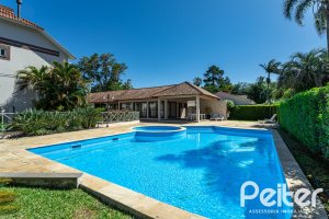 Casa em Condomínio à venda com 250m², 3 dormitórios, 1 suíte, 3 vagas, no bairro Tristeza em PORTO ALEGRE