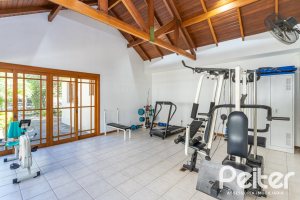 Casa em Condomínio à venda com 250m², 3 dormitórios, 1 suíte, 3 vagas, no bairro Tristeza em PORTO ALEGRE