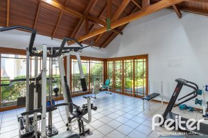 Casa em Condomínio à venda com 250m², 3 dormitórios, 1 suíte, 3 vagas, no bairro Tristeza em PORTO ALEGRE