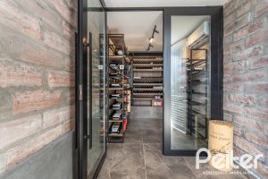 Casa em Condomínio à venda com 303m², 3 dormitórios, 3 suítes, 4 vagas, no bairro Alphaville em PORTO ALEGRE